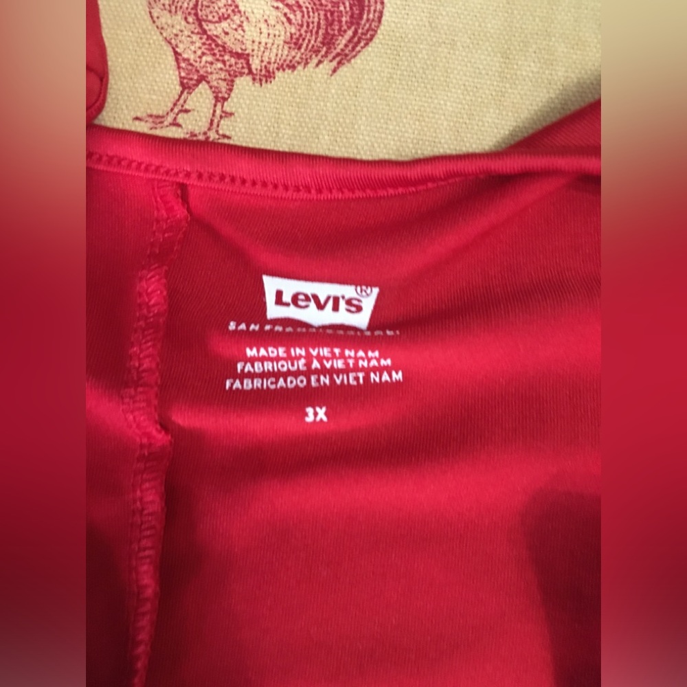 Adorable plus size body suit or bathing suit by Levi’s